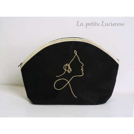 Trousse Femme noire et dorée